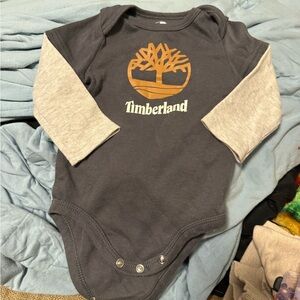 Timberland Charcoal and Off-White Baby Onesie